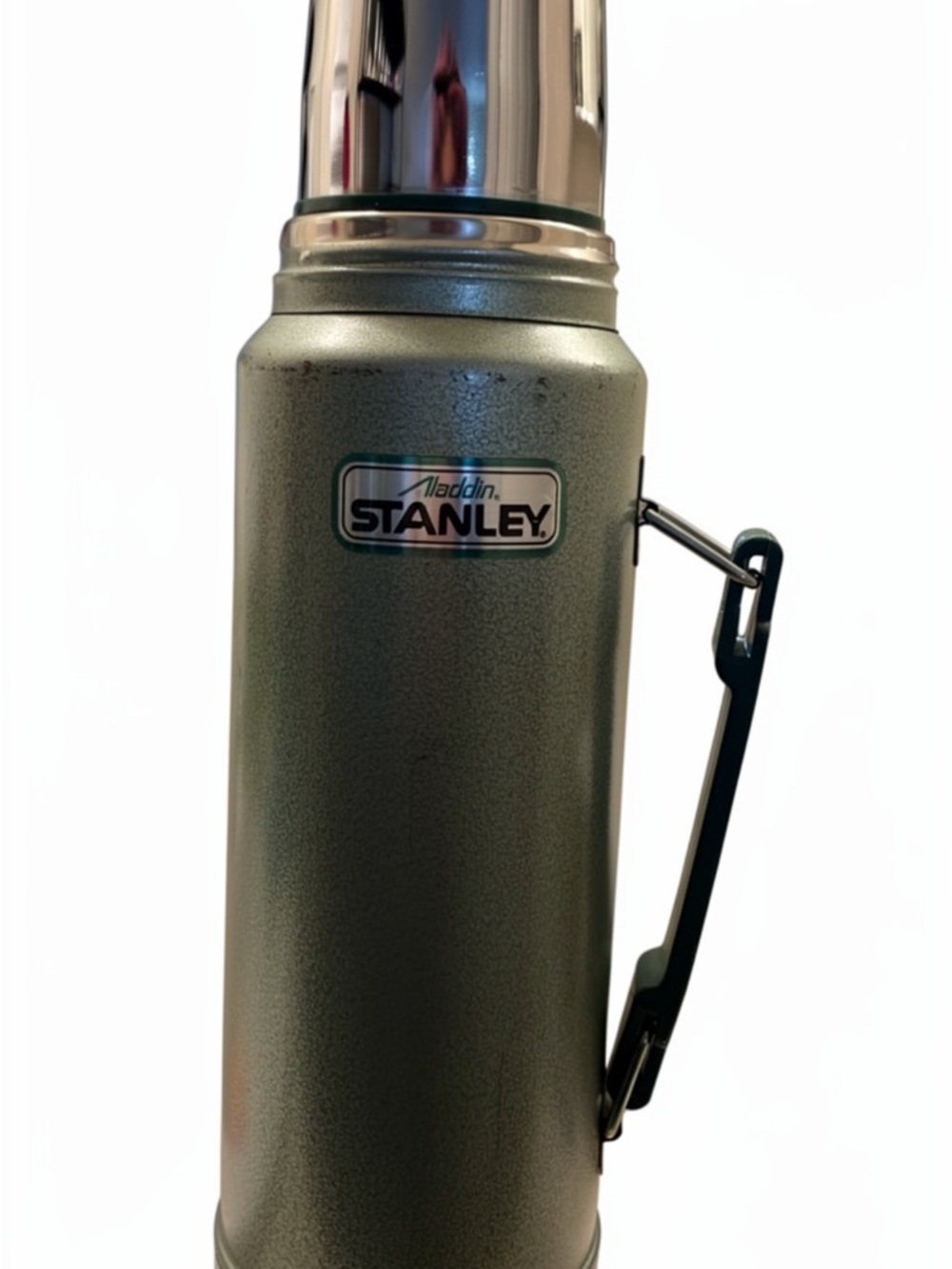 Vintage Aladdin Stanley metal quart thermos in hammertone green.